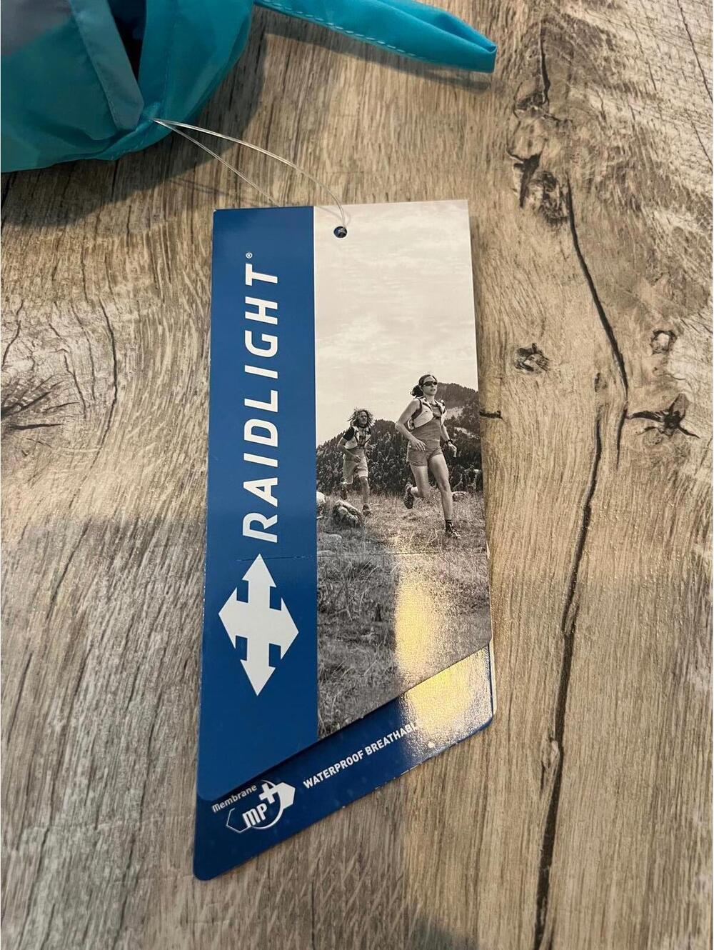 New Women's Raidlight Ultralight MP+ Blue Waterproof Breathable Jacket with Hood - Picture 12 of 14